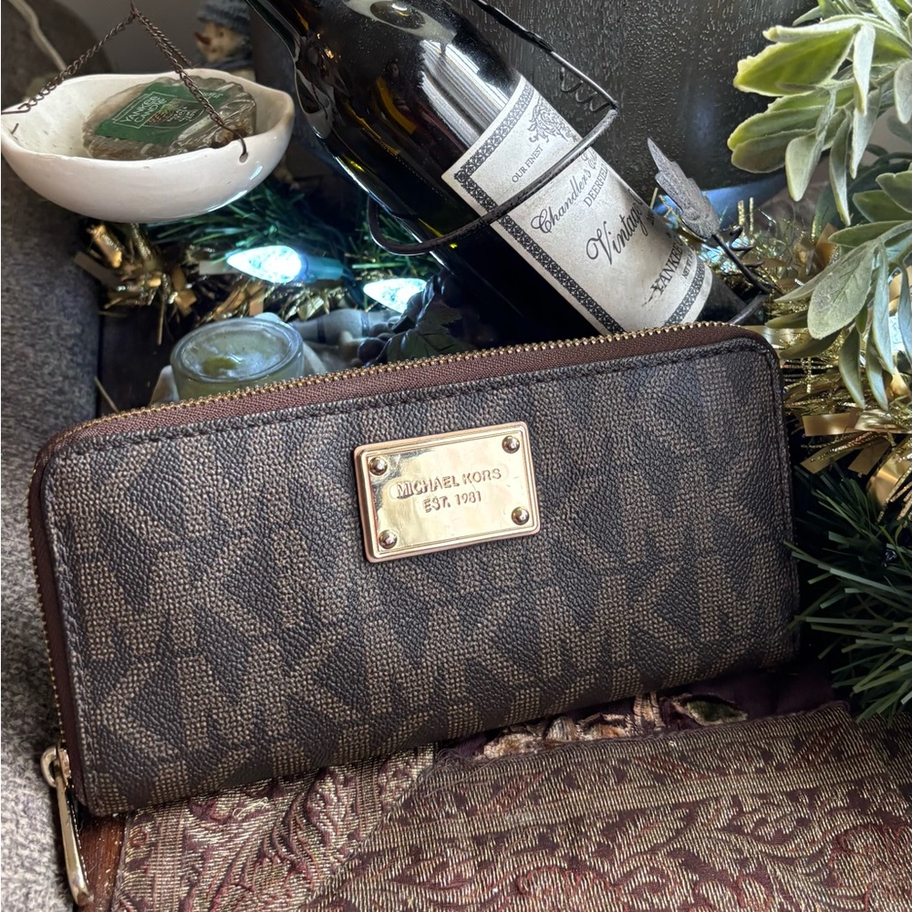 Authentic Michael Kors leather/signature zip around continental Wallet